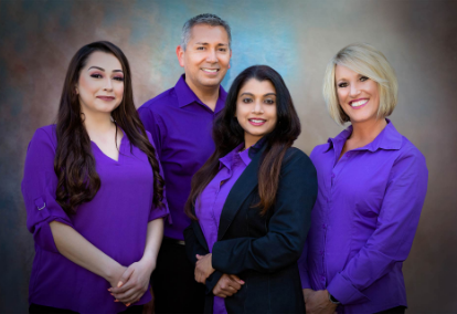Smiling dentist and team members at Sunnyvale Family and Cosmetic Dentistry